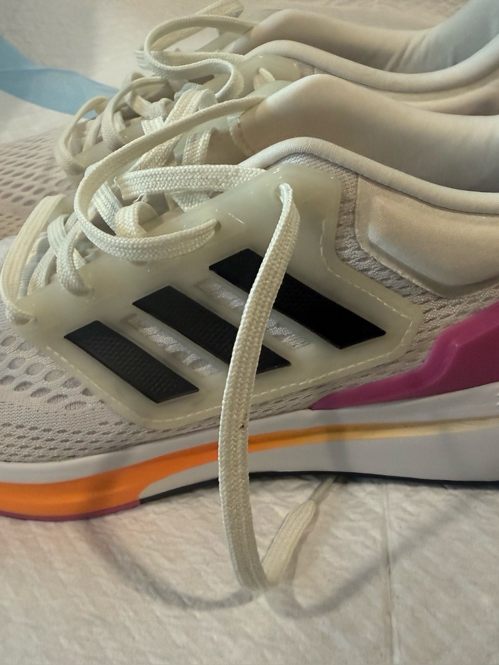 adidas Women’s White Running Shoes with Black Stripes and Pink & Orange Accents